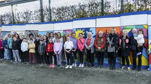 Photographed in front of the mural are just some of the 48 Junior STAG members, with STAG Adult Artists who painted the very colourful and extensive mural over the Summer months on the hoarding at the Kickhan Barracks, Clonmel. Mural Kickham Barracks Clonmel